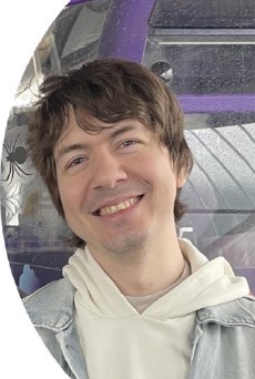 Portrait photo of Jesus Perdomo Lampignano smiling at the camera